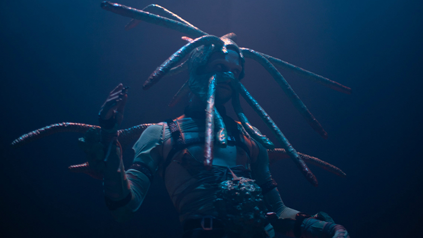 A person in a costume with tentacles