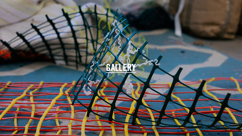 Close up of different coloured materials with the word 'Gallery' overlaid.