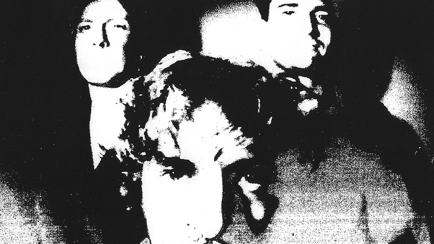 A black and white grainy image of the three members of Cutting Room